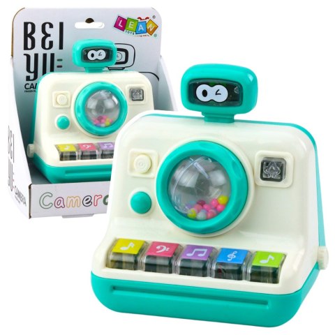 LEAN Toys Interaktywny Aparat Pianinko Grzechotka Światła Dźwięki Biało Zielony LEAN Toys Interaktywny Aparat Pianinko Grzechotka Światła Dźwięki Biało Zielony