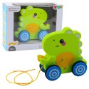 LEAN Toys Dinozaur Na Sznurku Jeżdżący Do Ciągnięcia Dla Malucha Grzechotka Zielony