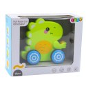 LEAN Toys Dinozaur Na Sznurku Jeżdżący Do Ciągnięcia Dla Malucha Grzechotka Zielony